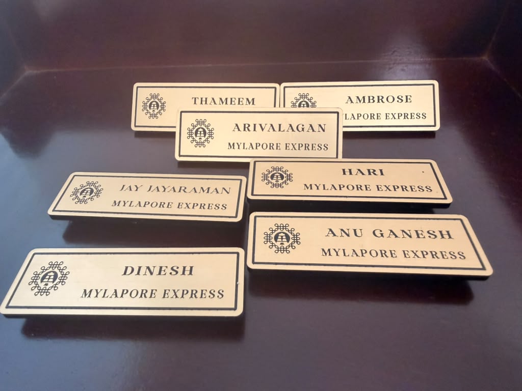 Custom wood name badges with scalloped edges for Abinaya Crafted Gifts Boutique and Dhara Creations