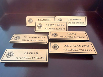 Custom wood name badges with scalloped edges for Abinaya Crafted Gifts Boutique and Dhara Creations